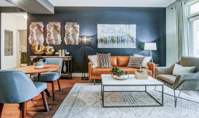 Find your perfect fit at Platform at Grant Park a living room with a couch and chairs
