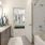 a bathroom with a tub sink and a bathtub