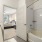 a bathroom with a tub and sink