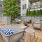 a patio with chairs and tables