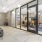 room with a large glass wall and a couch