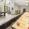 a room with a table and chairs and shuffle board game