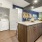 a kitchen with white cabinets