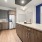 a kitchen with wooden cabinets