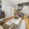 a living room with a couch and a table