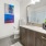 a bathroom with a large mirror