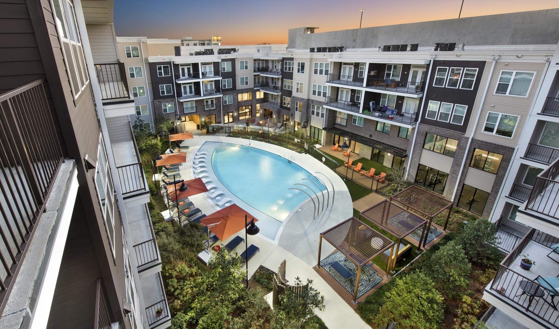 Settle into comfort at Platform at Grant Park a pool in a courtyard